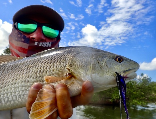 A.M. Lures Solid Redfish In The Marsh Kayak Fishing 